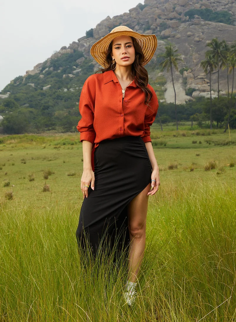 Campus Sutra  Women's Rust Orange Textured Oversized Shirt For Casual Wear | Spread Collar | Long Sleeve | Button Closure | Oversized Shirt Crafted With Comfort Fit For Everyday Wear for Women | Best Price UAE